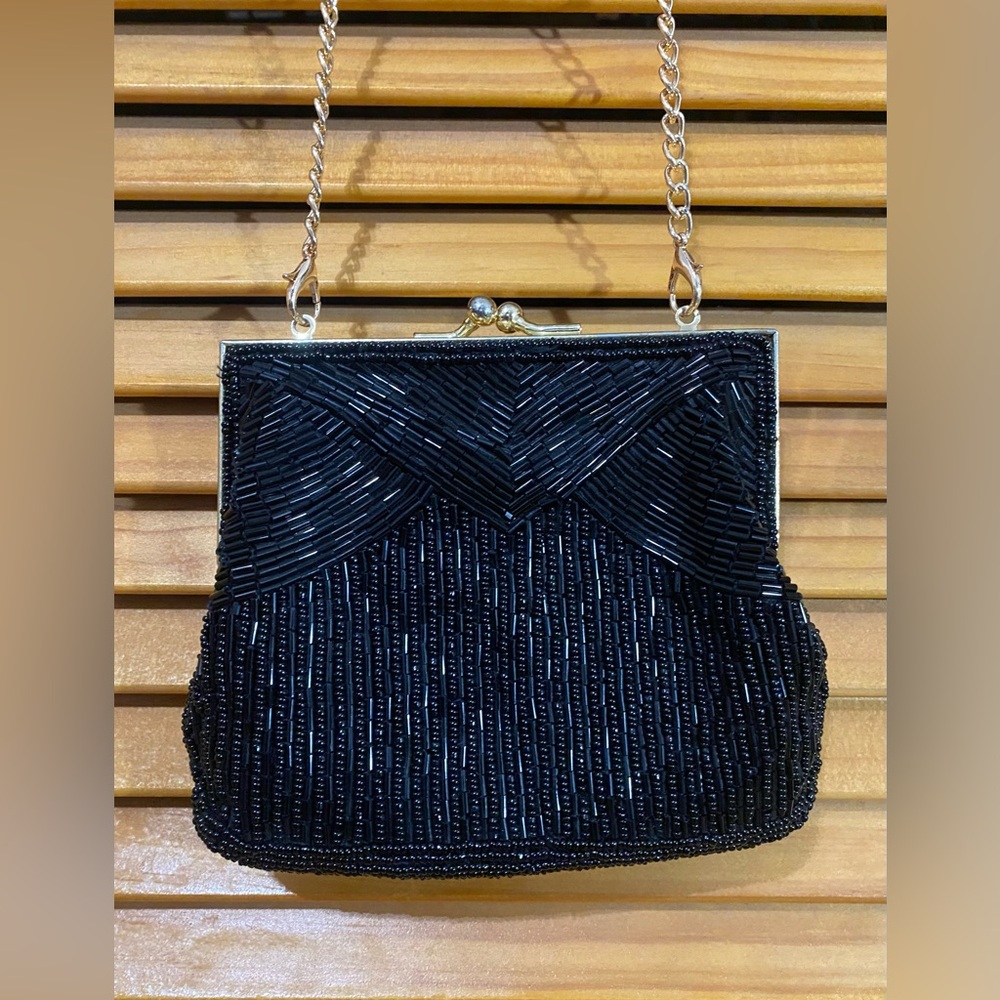 Vintage, black-sequined crossbody clutch with clip-on-or-off strap
